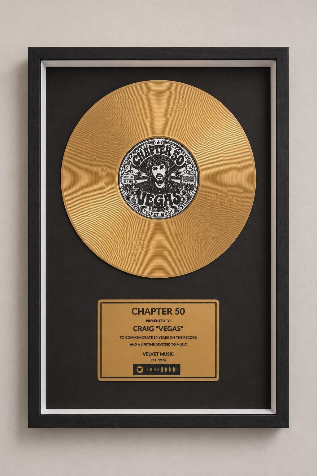 Personalised gold disc with label and plaque in a black frame